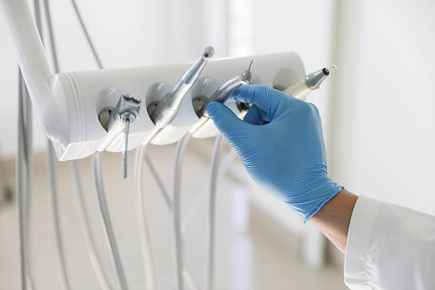 Professional Tooth Extraction technician working in St. Marys, OH